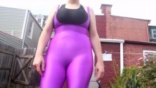 Sexy Woman Purple Catsuit Seduction