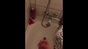 Young boy wanks in shower