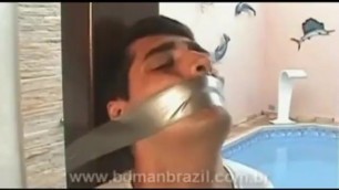 Big Mouth Tied To Post By Bunkmates, Tightly Gagged, Left and Humiliated