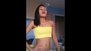 Super Fit Asian Girl Malee Smoking a Marlboro Red - Triple Pumps