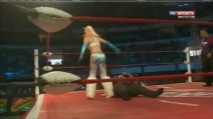 Female to male wrestling belly trample in sexy fur boots