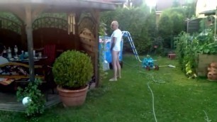 funny older man pees in the back yard repost