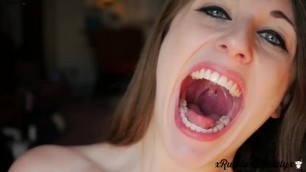 Hot giantess shows mouth and feet