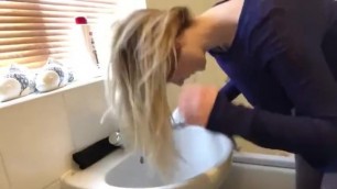 Blonde Hair wash over sink