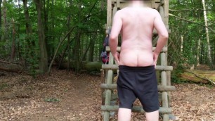 Guy stripping in the forest and wanking his cock to cum
