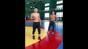 two.young asian boy play ballbusting