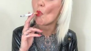 Leather lady smoking