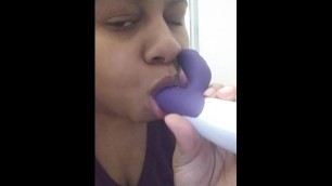 Ebony milf Deep throating toy with pussy juices on it