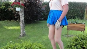sexyputa walking in the garden with mini skirt