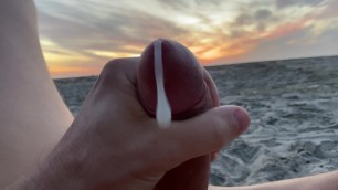 Outdoors masturbation jacking off public beach at sunset