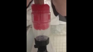 Fucking my Fleshlight  Red Holiday Quickshot  attached to the shower mount