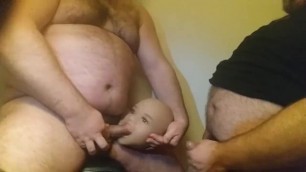 Sex doll head fucking by two bears