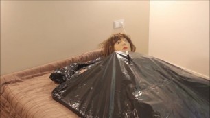 Doll in homemade vacuum bed