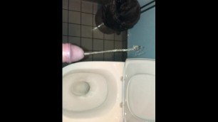 Messing in a publiv toilet with male uncut urine.