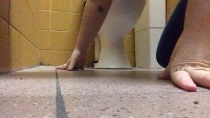 Dirty woman licks bathroom floor