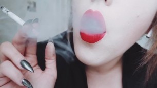 MISTRESS WITH LUSCIOUS RED LIPS CLOSE-UP SMOKING CIGARETTE