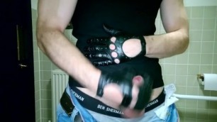 Lean muscle uncut jerking off in black leather gloves