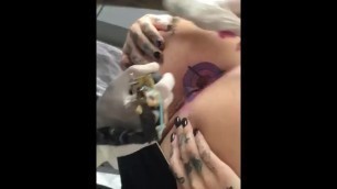 nice ass girl gets her ass hole tattooed