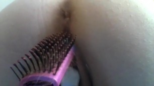 up close view of bbw with a fat ass fucking herself with hairbrush