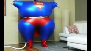 Big boy in a superman costume