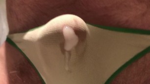 Cumming through green thong close up cumshot