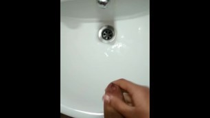 Oiled dick cumming on bath
