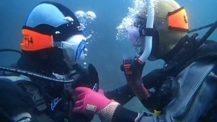 Drysuit scuba kissing