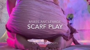 Scarf play on a naked booty