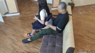 Girl Playing Video Games Sitting on the Legs of her Pervert Old who takes advantage of her innocence